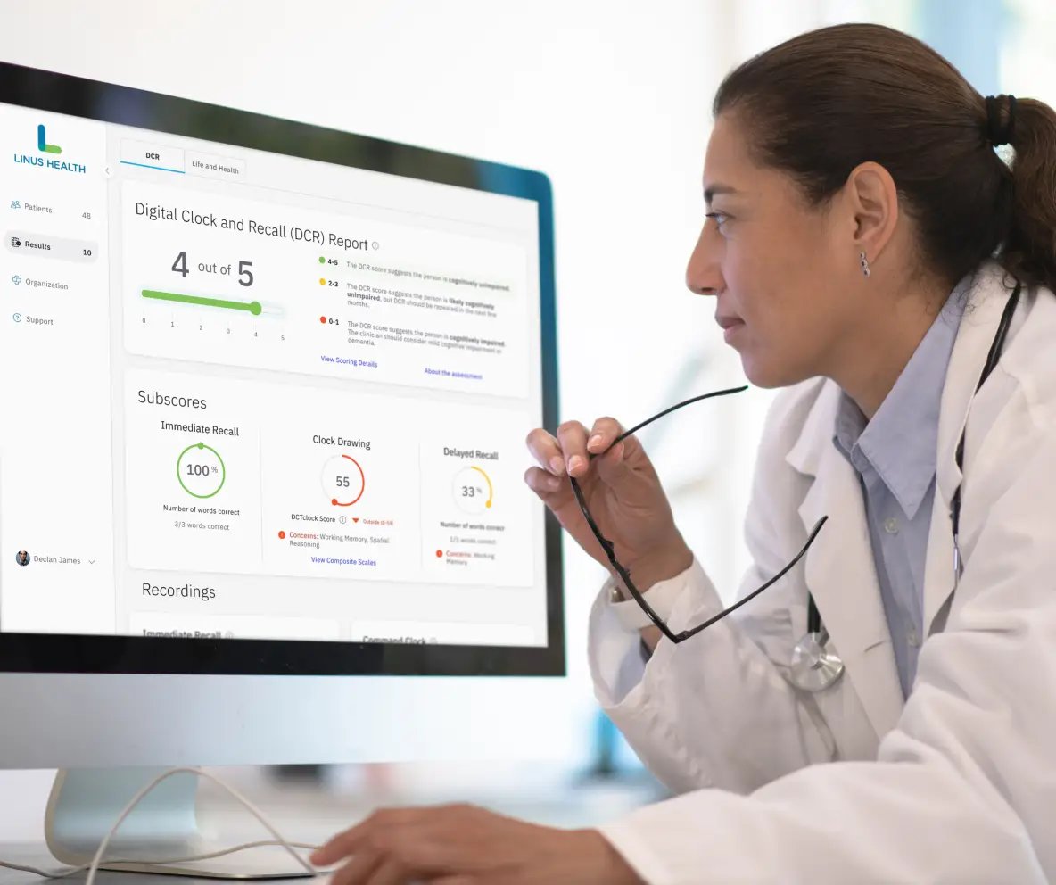 Primary Care Provider reviewing the results of a digital cognitive assessment. Modern cognitive assessment platforms, like the one from Linus Health, provide greater insights into a patients cognitive function, improve practice efficiency and opens new revenue streams