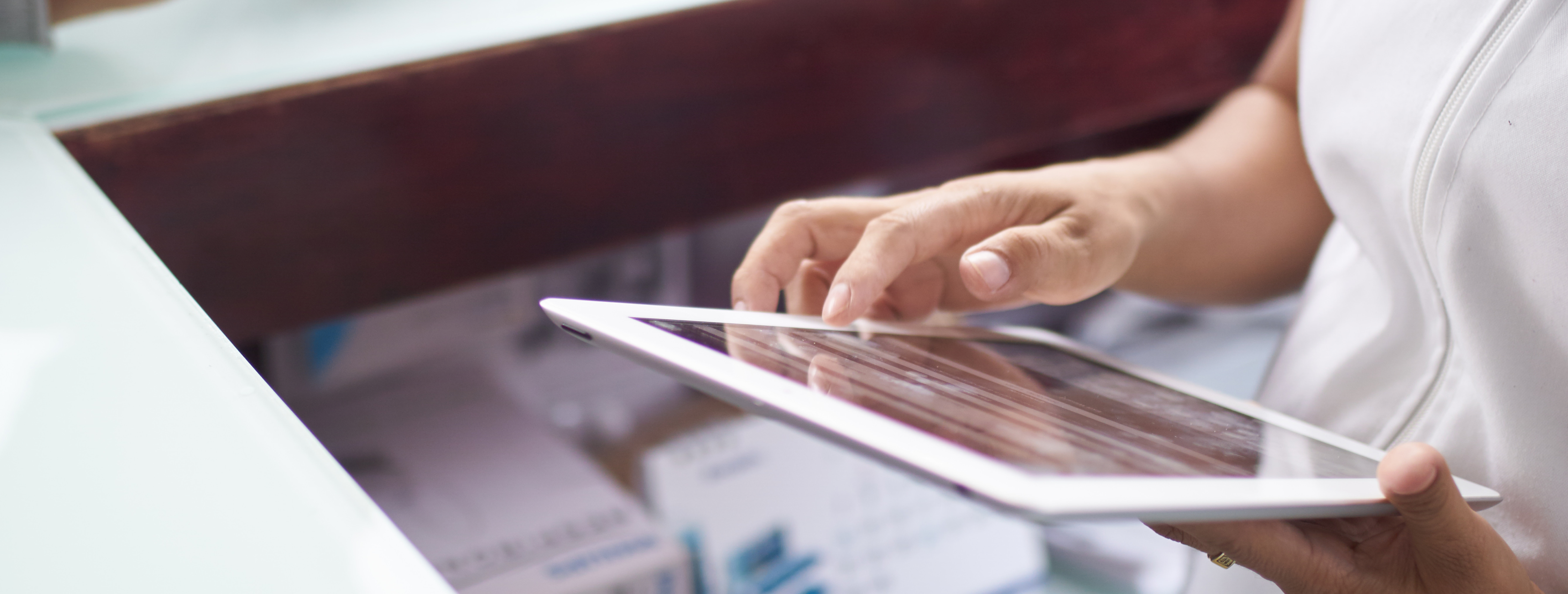 Primary care provider reviewing test results from a digital cognitive assessment on and iPad. Digital cognitive testing from Linus Health delivers increased sensitivity and greater insights into a patient's cognitive function versus traditional assessments like MOCA and MMSE